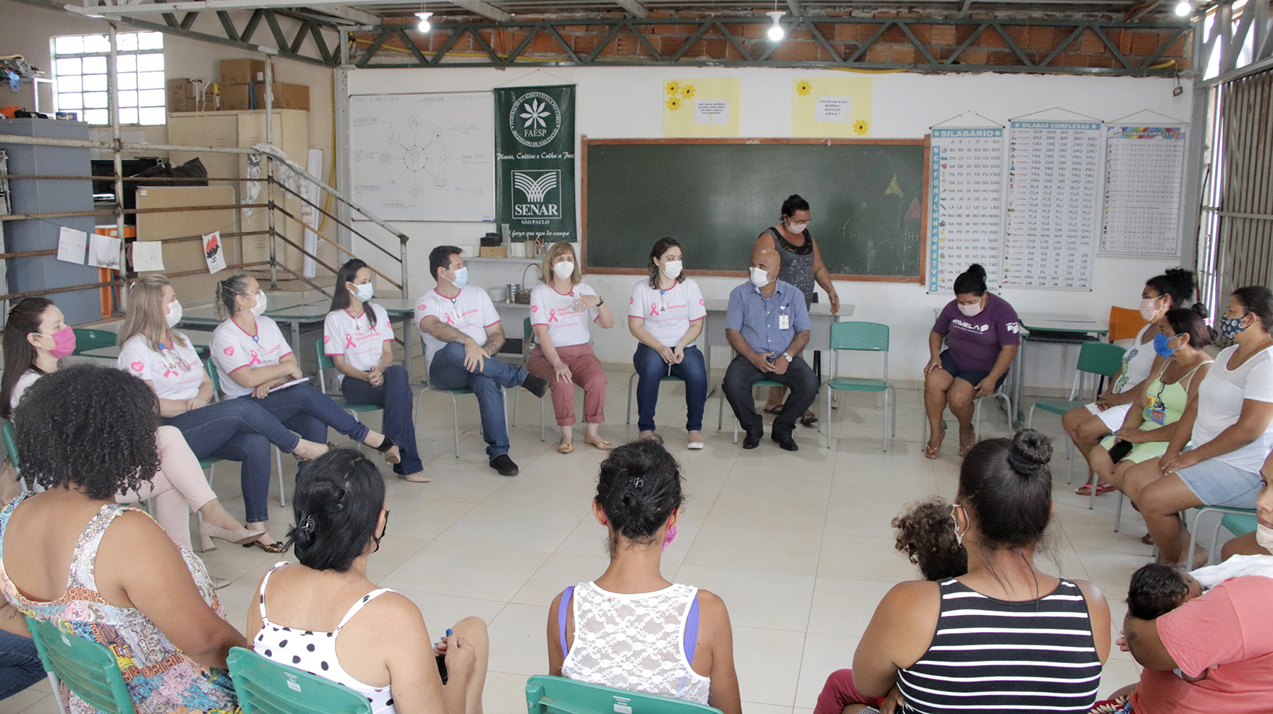Ilustração da notícia HB Onco e Hospital de Base lançam campanha Outubro Rosa 2021 em ação com moradoras na Comunidade da Vila Itália